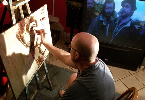 Todd Peterson working on his painting of Fu